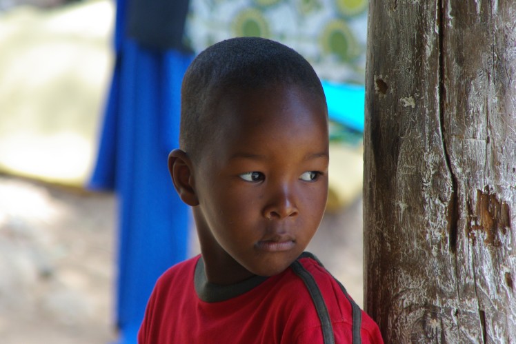 Boy looking to the side.
