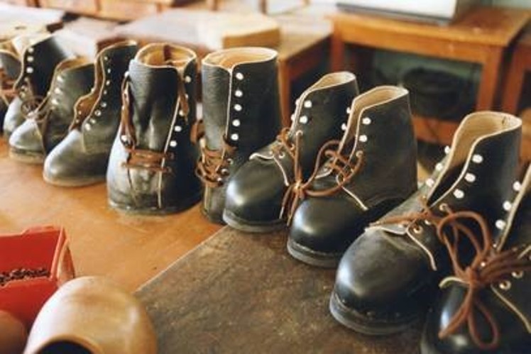 A row of donated shoes.